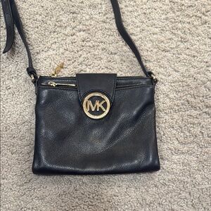 Michael Kors Black and Gold Crossbody Bag with Sleek Design